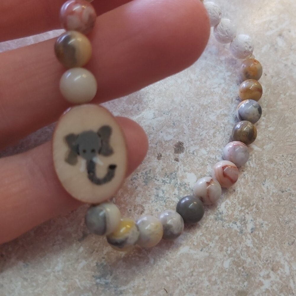 handmade mother of pearl elepant bead with jasper and lava beads for aroma